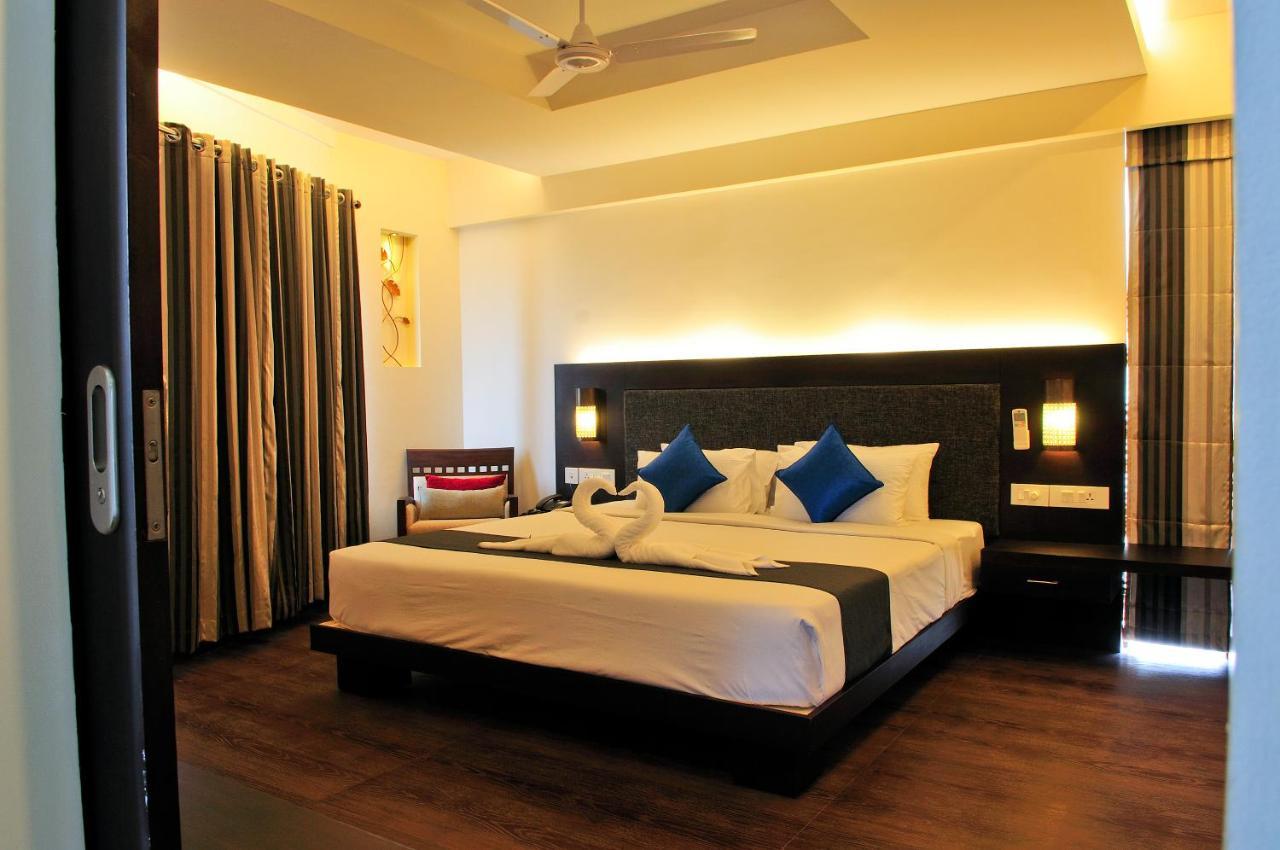 Copper Folia Hotel Kozhikode Bagian luar foto