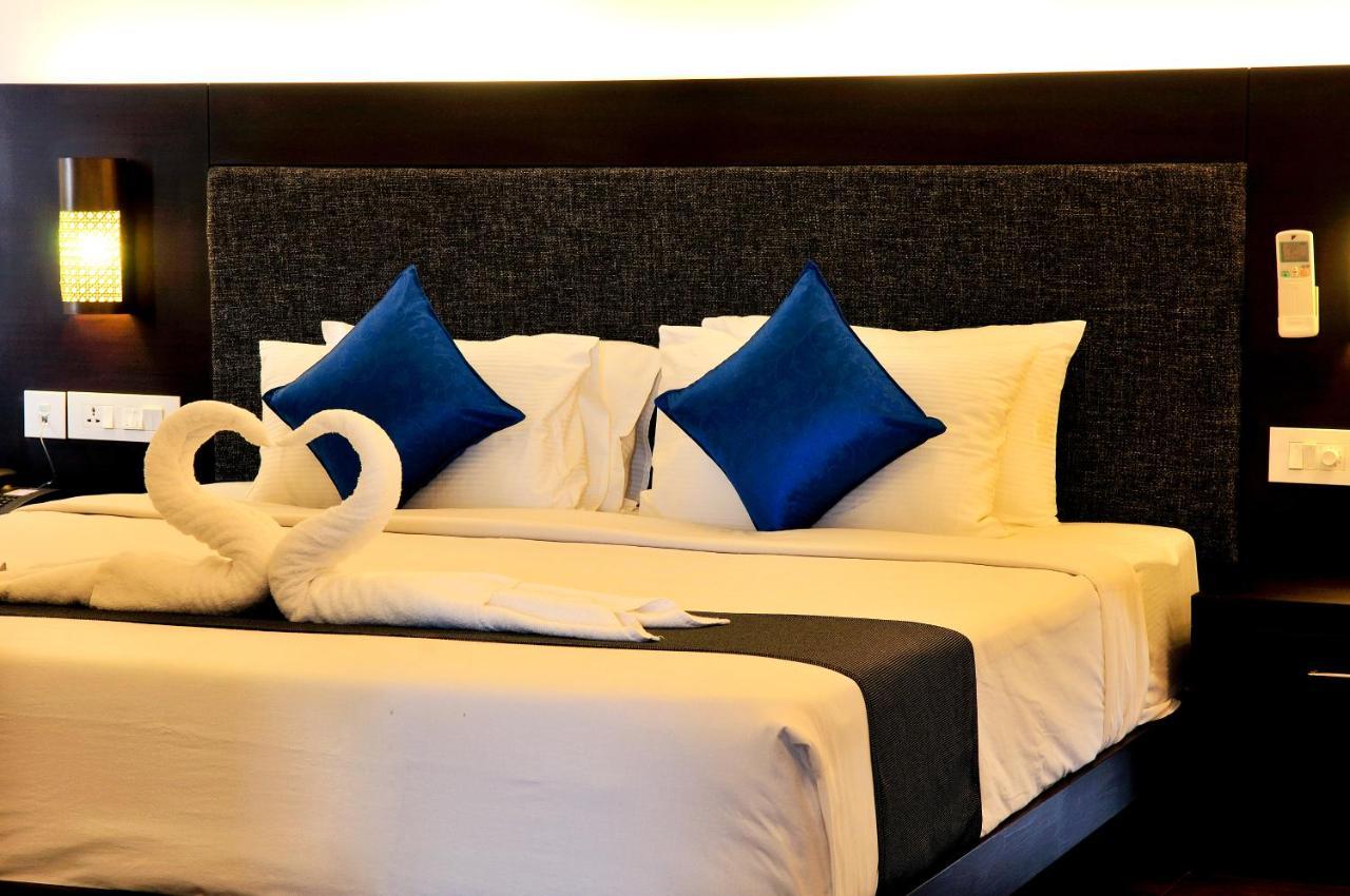 Copper Folia Hotel Kozhikode Bagian luar foto