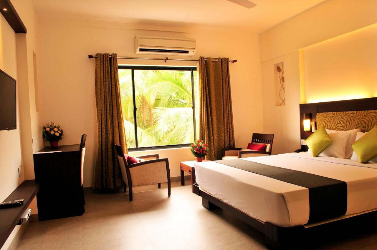 Copper Folia Hotel Kozhikode Bagian luar foto