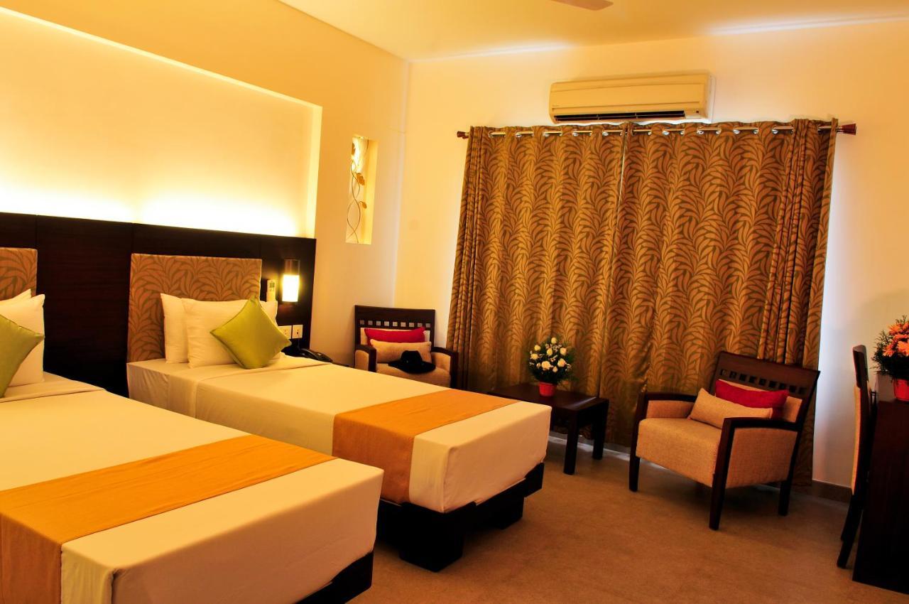 Copper Folia Hotel Kozhikode Bagian luar foto