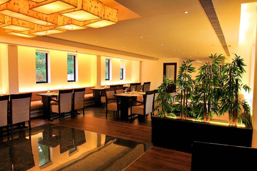 Copper Folia Hotel Kozhikode Bagian luar foto