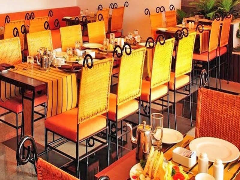Copper Folia Hotel Kozhikode Bagian luar foto